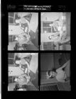 Man and woman looking at paper; Woman sitting on couch (4 Negatives) (April 1, 1958) [Sleeve 5, Folder d, Box 14]